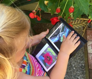 Adelyn_with_bird_book-closeup.1600